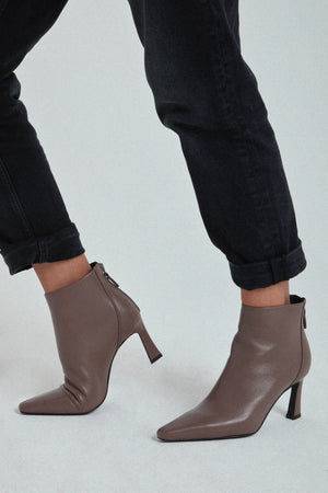 
                  
                    Load image into Gallery viewer, Shaila pointed toe ankle boot in soft taupe leather
                  
                