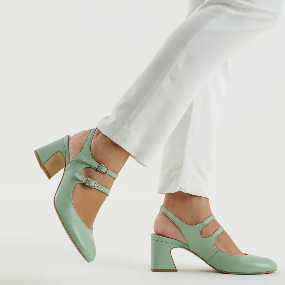 
                  
                    Load image into Gallery viewer, Isa sling back decolletè with double strap on instep, round toe and wide heel in pastel green leather
                  
                